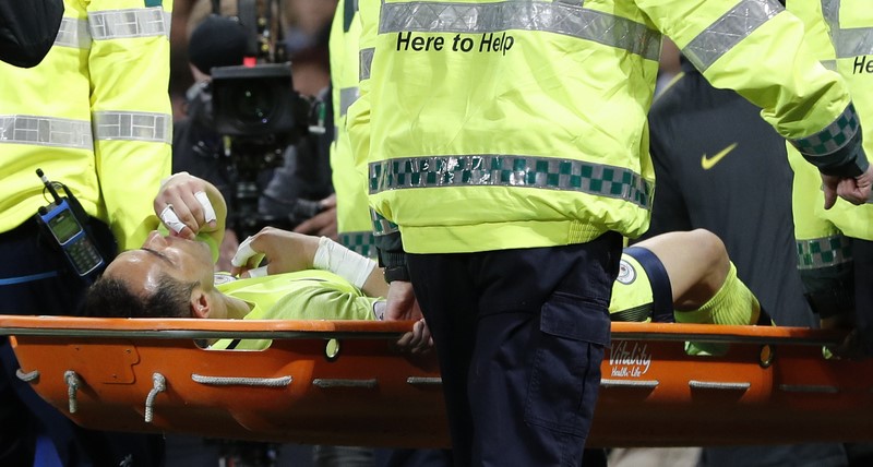 © Reuters. Manchester City's Claudio Bravo is stretchered off injured