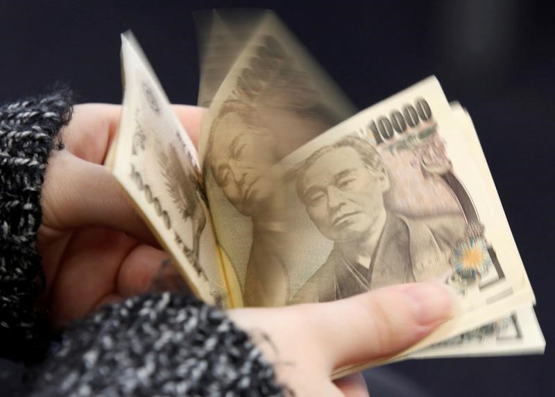 © Reuters. JAPON: INFLATION PLUS FAIBLE QUE PRÉVU EN MARS