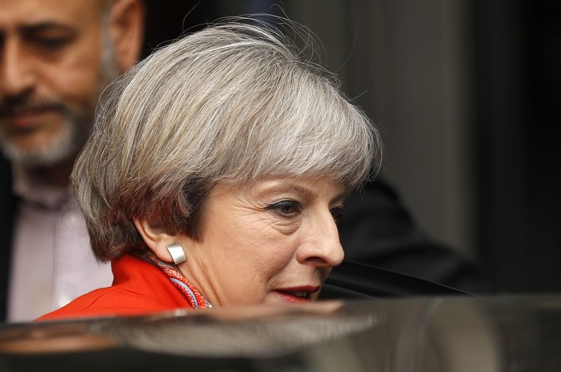 © Reuters. Britain's Prime Minister Theresa May leaves the BBC, in London