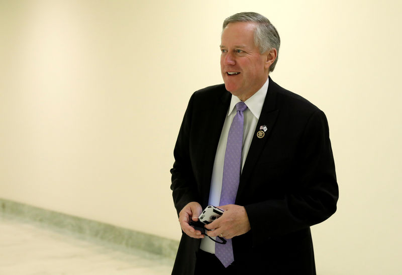 © Reuters. Mark Meadows walks in a hallway on Capitol Hill in Washington