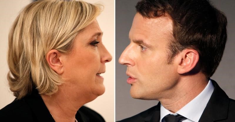 © Reuters. A combination picture shows portraits of candidates for the second round in the 2017 French presidential election Marine Le Pen and Emmanuel Macron