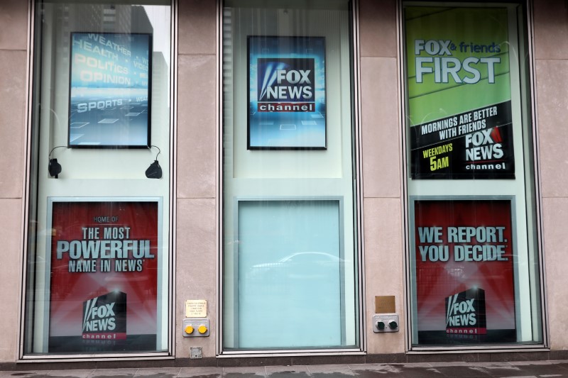 © Reuters. A white board is seen where a poster for former Fox News Channel TV anchor Bill O'Reilly used to hang outside Fox News Channel and News Corporation Headquarters in New York