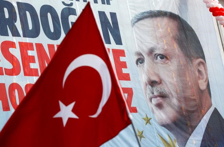 © Reuters. A huge banner with a picture of Turkish President Tayyip Erdogan is seen on a building during a ceremony in Istanbul