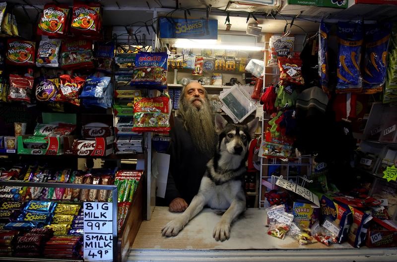 © Reuters. William Mulhall poses for a photograph in his old curiosity shop in the small seaside village of Ardglass in Co.Down