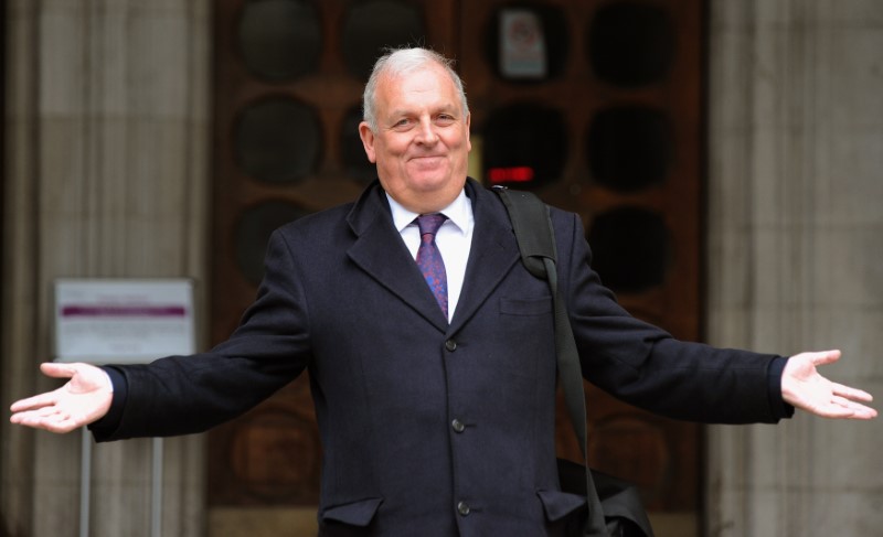 © Reuters. Former Sun newspaper editor Kelvin MacKenzie gestures as he leaves the Leveson Inquiry at the High Court in central London