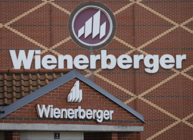 © Reuters. Logos of Wienerberger, the world's biggest brick maker, are pictured at its headquarters in Hennersdorf