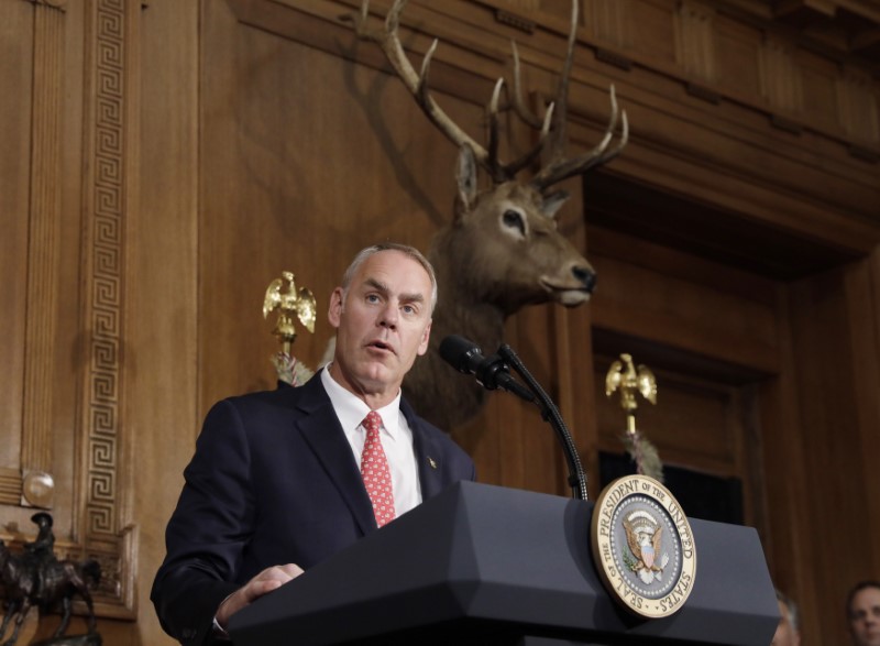 © Reuters. U.S. Interior Secretary Zinke speaks prior to President Trump signing executive order reviewing previous National Monument designations made under the Antiquities Act,  at the Interior Department in Washington