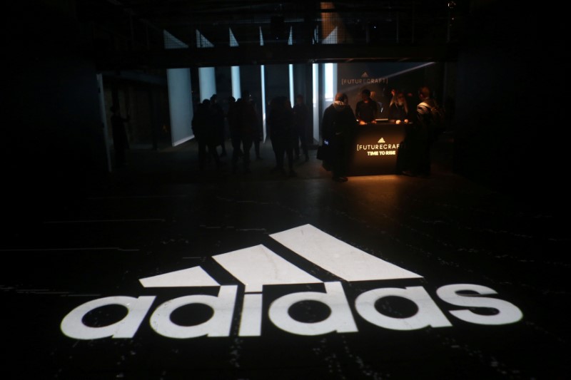 © Reuters. FILE PHOTO: An Adidas logo is seen at the new Futurecraft shoe unveiling event in New York City