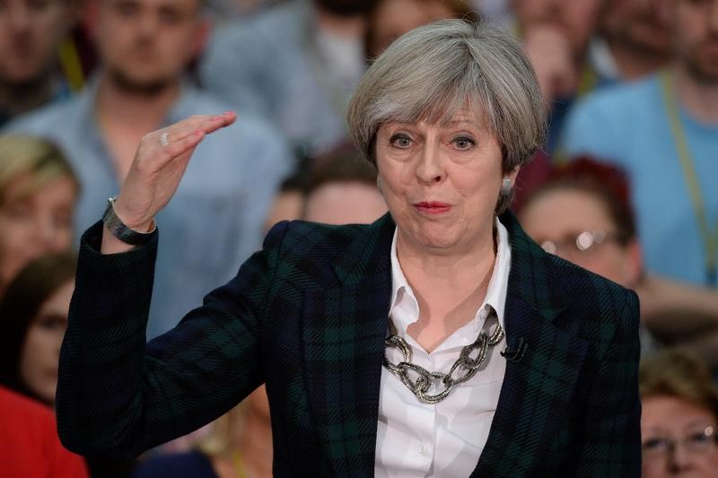 © Reuters. Britain's Prime Minister Theresa May speaks at a general election campaign event at marketing services group Linney, in Mansfield