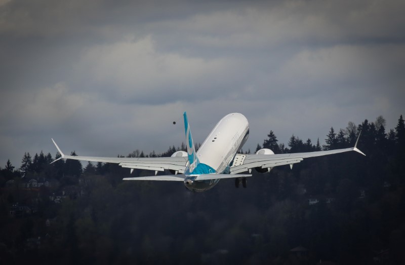 © Reuters. Handout of Boeing’s new 737 MAX 9 aircraft is seen during takeoff on its first flight in Renton