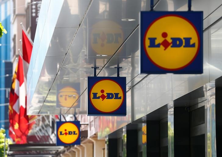 © Reuters. Logos are pictured outside a Lidl retail shop in Geneva