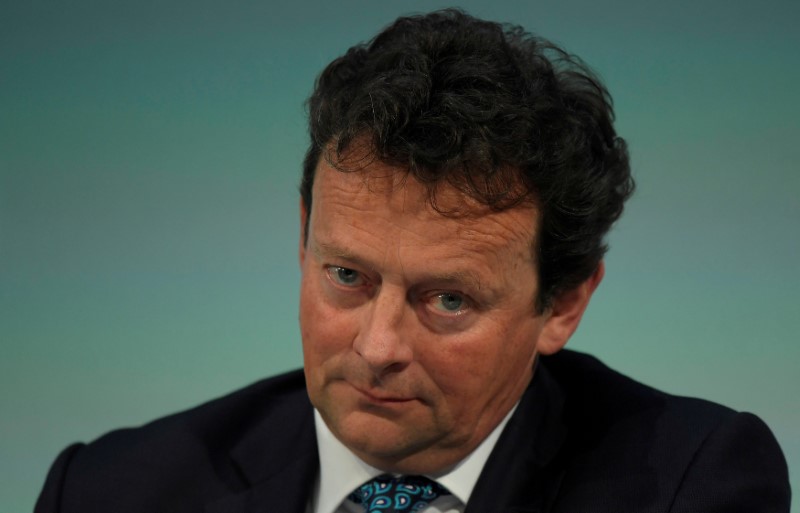 © Reuters. FILE PHOTO: Hayward, chairman of Glencore and Genel Energy responds to questions during a panel debate at the Institute of Directors annual convention in London, Britain