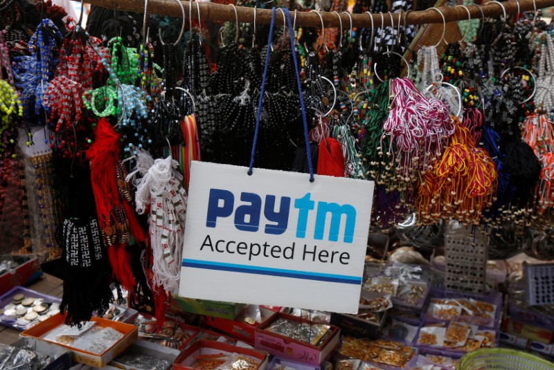 © Reuters. An advertisement of Paytm, a digital wallet company, is pictured at a road side stall in Kolkata