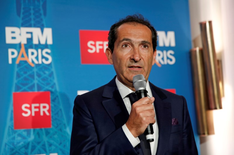 © Reuters. Patrick Drahi, Franco-Israeli businessman and Executive Chairman of cable and mobile telecoms company Altice, speaks during the launch of the news channel BFM Paris