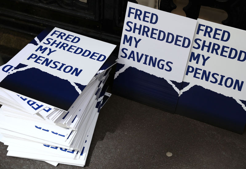 © Reuters. Placards are stacked outside of the Royal Courts on Justice in London