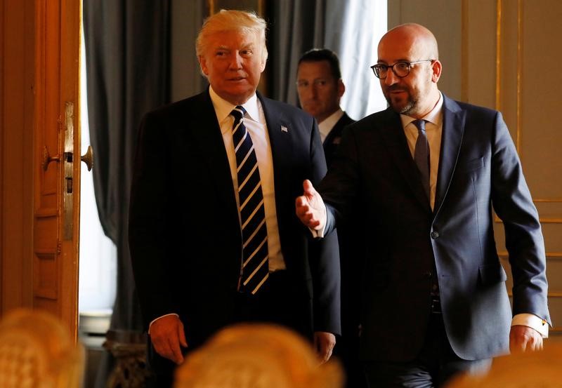 © Reuters. U.S. President Trump listens to Belgian PM Michel before their meeting in Brussels