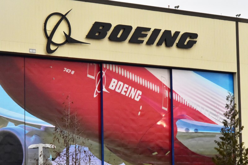 © Reuters. Boeing Co's logo is seen above the front doors of its largest jetliner factory in Everett