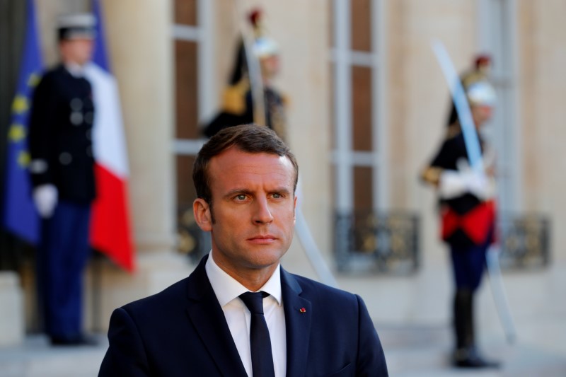 © Reuters. JOURNÉE DIPLOMATIQUE CHARGÉE POUR MACRON A BRUXELLES