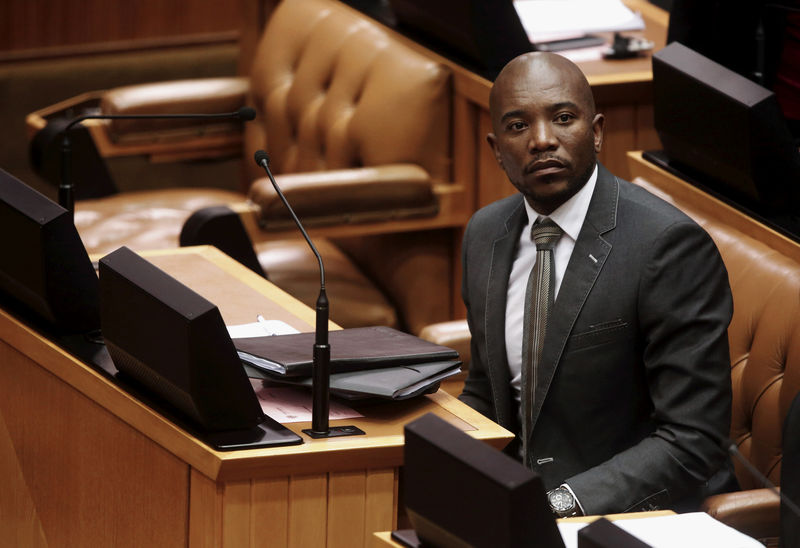 © Reuters. FILE PHOTO: South Africa's opposition Democratic Alliance (DA) leader Mmusi Maimane listens in  Parliament in Cape Town