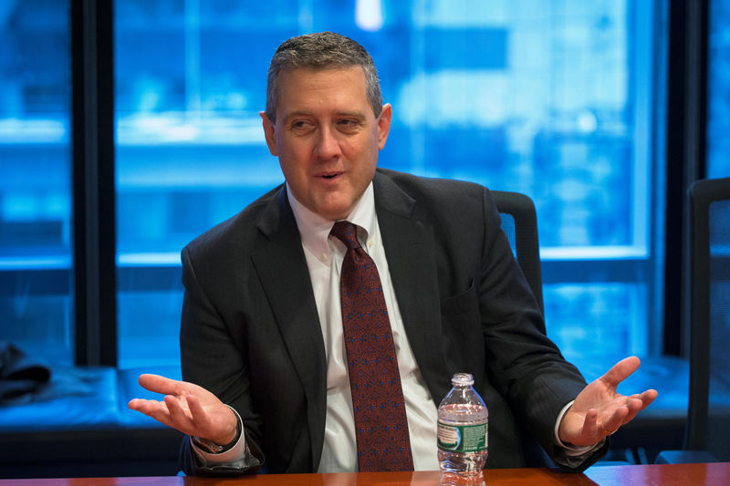 © Reuters. FILE PHOTO: St. Louis Fed President James Bullard speaks about the U.S. economy during an interview in New York
