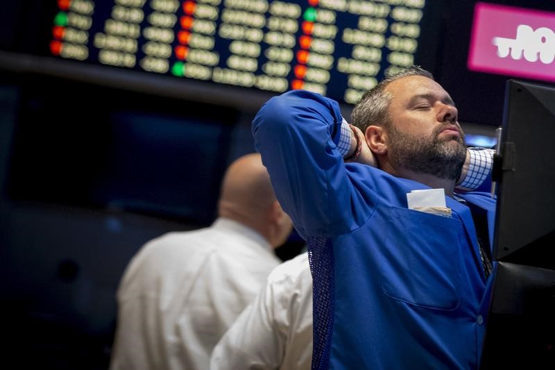 © Reuters. WALL STREET FINIT QUASIMENT INCHANGÉE