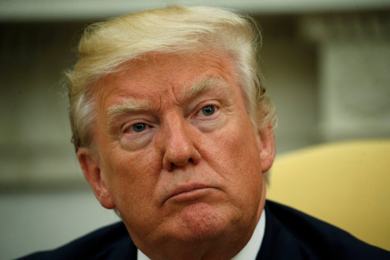 © Reuters. FILE PHOTO: U.S. President Donald Trump listens to question from the media at the White House in Washington