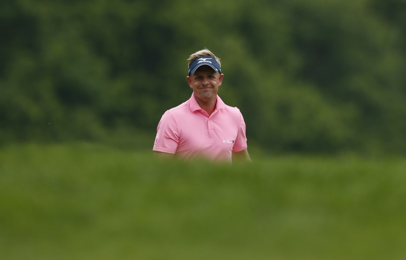 © Reuters. England's Luke Donald on the first hole during the third round