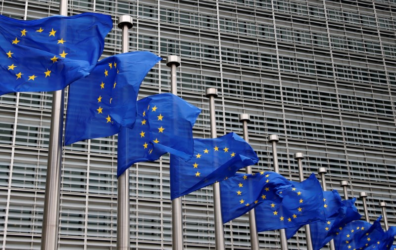 © Reuters. EU flags are lowered at half-mast in honor of the victims of the Manchester attack, outside the EU Commission headquarters in Brussels