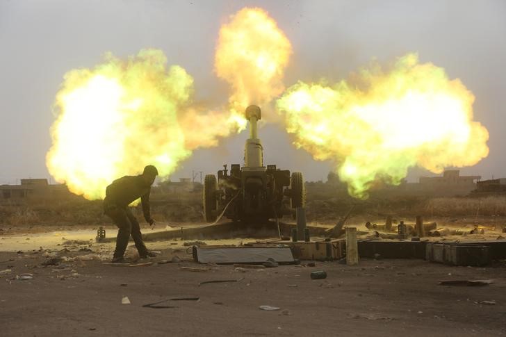 © Reuters. قوات الحشد الشعبي العراقية تسيطر على قرى على الحدود مع سوريا