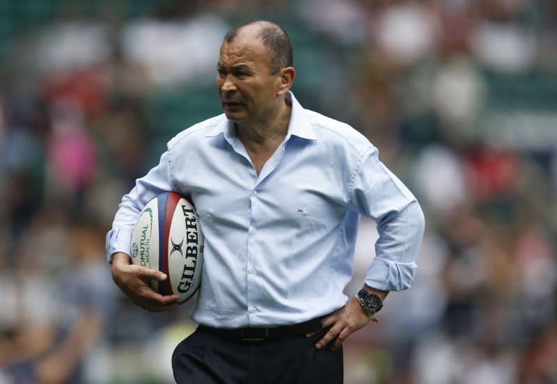 © Reuters. England coach Eddie Jones on the pitch before the match