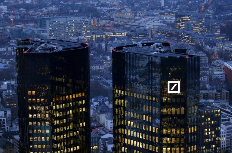 © Reuters. FILE PHOTO: The headquarters of Germany's Deutsche Bank is seen early evening in Frankfurt