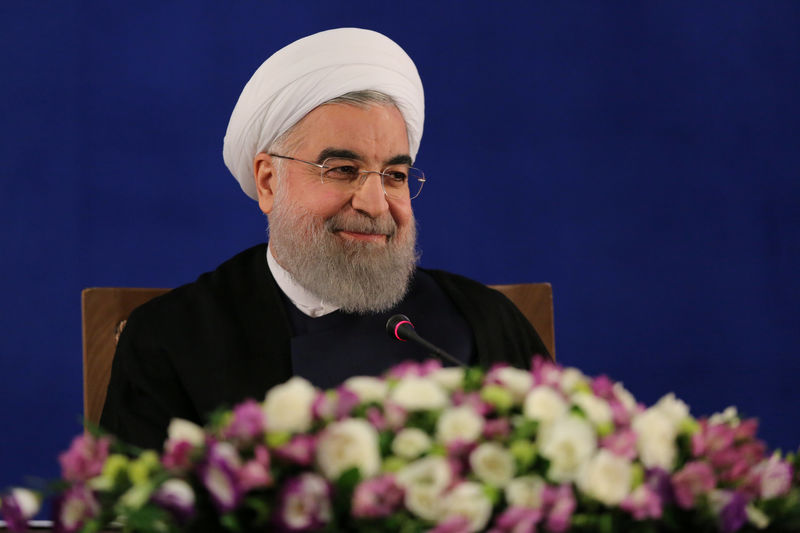 © Reuters. Iranian president Hassan Rouhani attends a news conference in Tehran