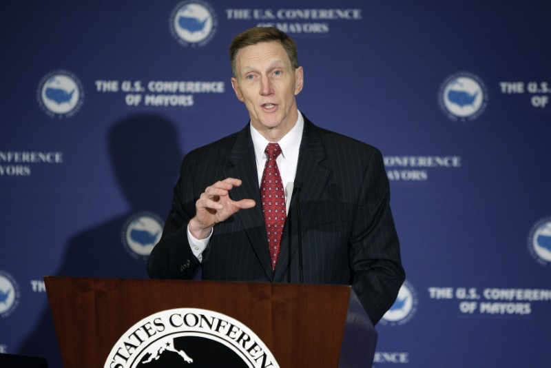 © Reuters. Pistole delivers remarks to the U.S. Conference of Mayors winter meeting in Washington