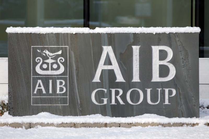 © Reuters. Snow rests on a sign outside the headquarters of AIB bank in south Dublin