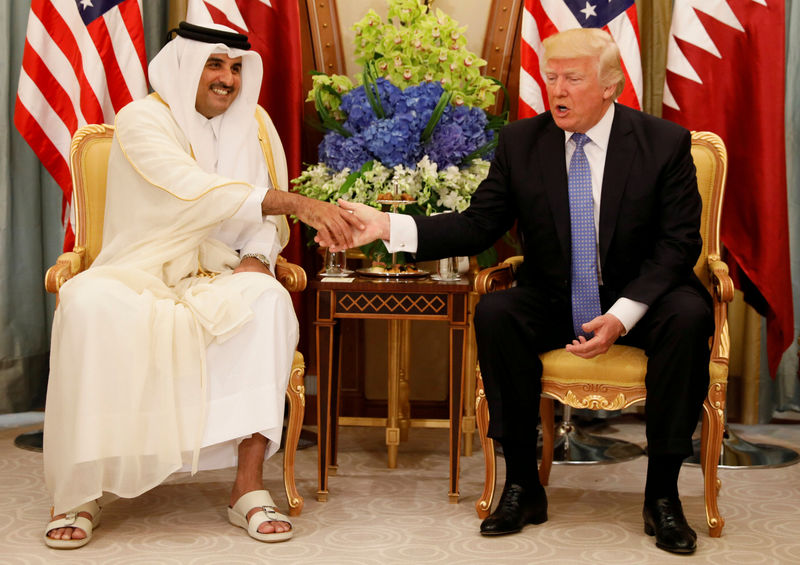 © Reuters. FILE PHOTO: Qatar's Emir Sheikh Tamim Bin Hamad Al-Thani meets with U.S. President Donald Trump in Riyadh