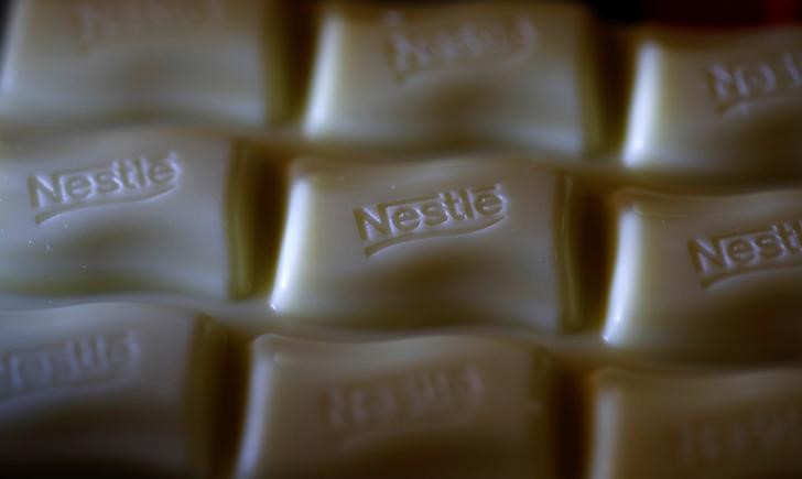 © Reuters. A Nestle company logo is pictured on a bar of Milky Bar chocolate in Manchester, Britain.