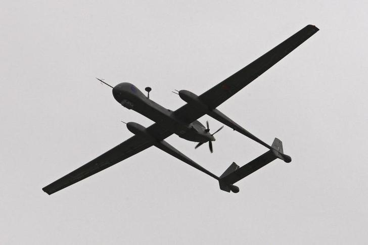 © Reuters. A Heron TP surveillance drone flies during an official inauguration ceremony at Tel Nof Air Force Base near Tel Aviv