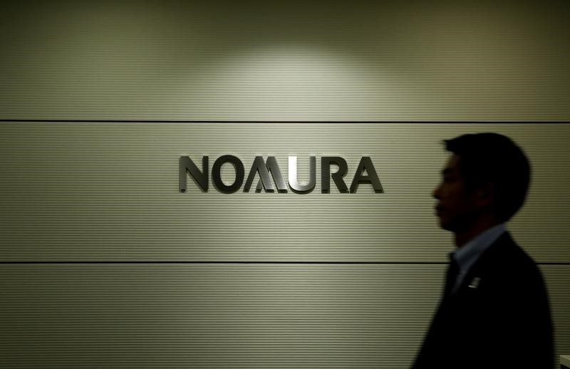© Reuters. Logo of Nomura Securities is pictured at the company's Otemachi Head Office in Tokyo