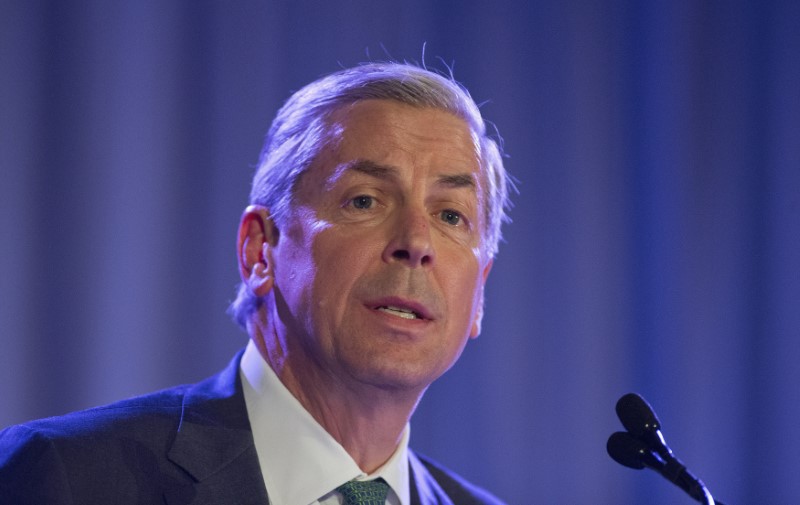 © Reuters. FILE PHOTO: Carroll, senior executive vice president at Wells Fargo speaks during the Charlotte Chamber's Economic Outlook Conference in Charlotte, North Carolina