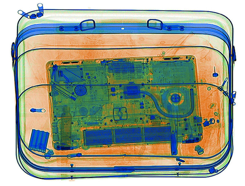 © Reuters. An illustration picture shows a laptop on the screen of an X-ray security scanner