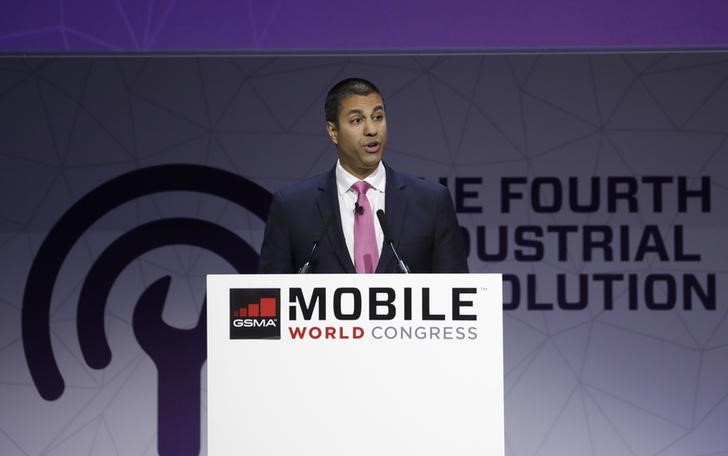 © Reuters. Pai, Chairman of U.S Federal Communications Commission, delivers his keynote speech at Mobile World Congress in Barcelona