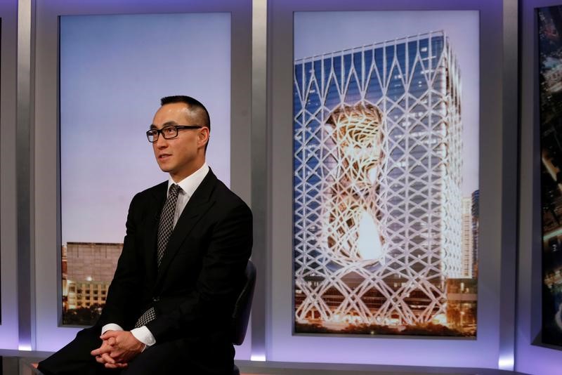 © Reuters. Lawrence Ho speaks during Reuters interview in Hong Kong