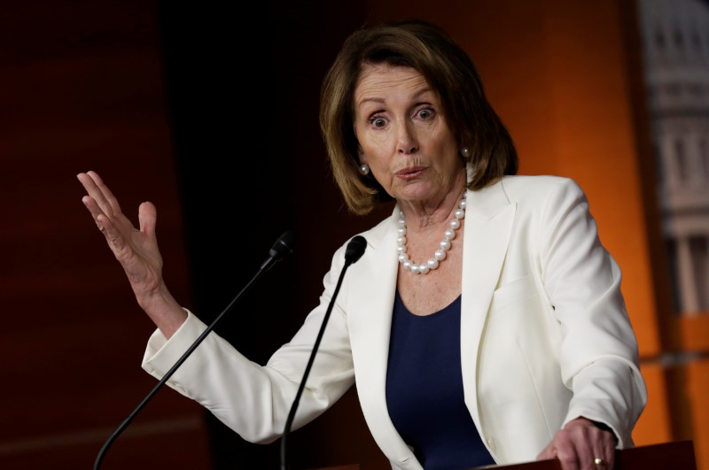 © Reuters. House Minority Leader Pelosi speaks during a news conference