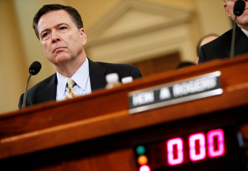 © Reuters. FILE PHOTO: Comey testifies before the House Intelligence Committee hearing into alleged Russian meddling in the 2016 U.S. election, on Capitol Hill in Washington