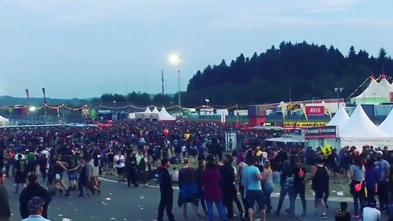 © Reuters. Video grab of people leaving the open-air weekend "Rock am Ring" concert near the Nuerburgring race track in Nurburg, Germany