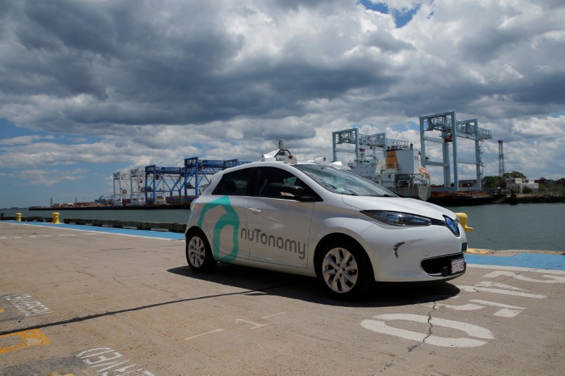 © Reuters. A self-driving car being developed by nuTonomy, a company creating software for autonomous vehicles, is guided down a street near their offices in Boston