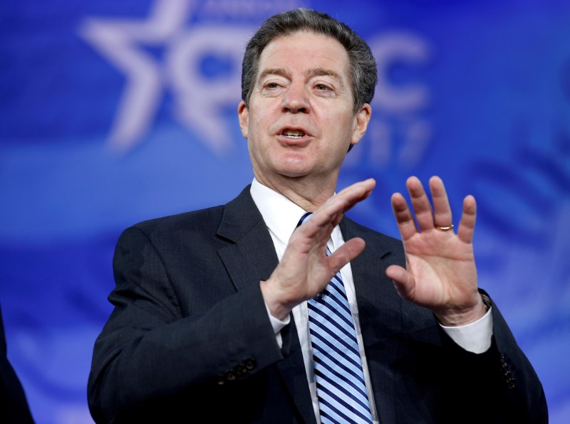 © Reuters. FILE PHOTO - Republican Governor Sam Brownback of Kansas, speaks during the Conservative Political Action Conference (CPAC) in National Harbor, Maryland