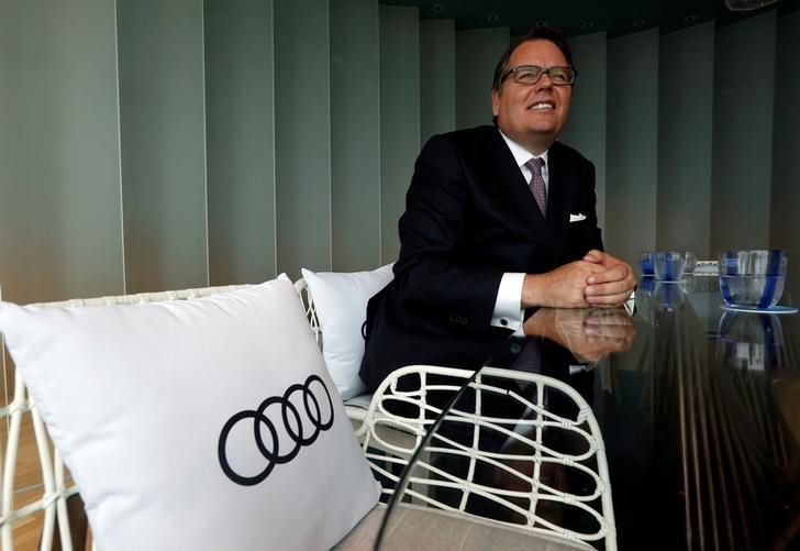 © Reuters. Dietmar Voggenreiter, member of the Board of Management for Sales and Marketing at Audi AG, poses during in Hong Kong