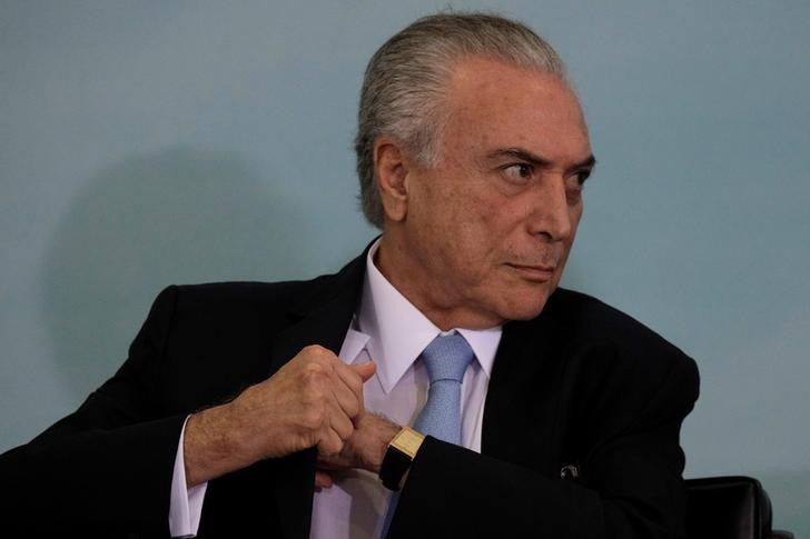 © Reuters. Brazil's President Temer reacts during ceremony in Brasilia