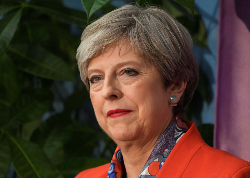 © Reuters. Britain's Prime Minister Theresa May waits for the result of the vote in her constituency at the count centre for the general election in Maidenhead,